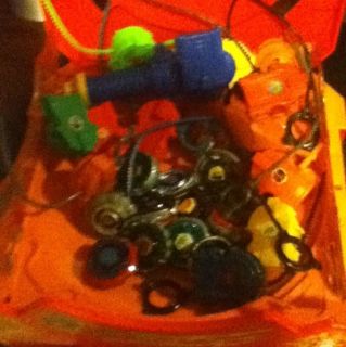 Lot of Beyblades Including The Stadium and Launcher Grip
