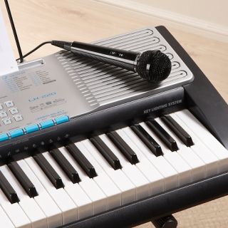Casio Lighted Keyboard with Stand, Microphone and Song Book