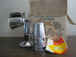 This listing is for a vintage King Kutter Food Processor. It is used