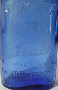 Medicine Bottle Cobalt Blue Embossed Milk of Magnesia