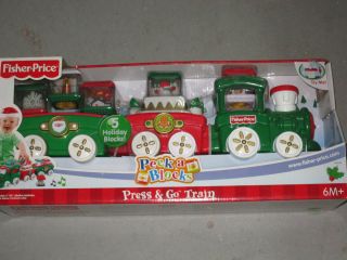 Fisher Price Press Go Train Christmas Version NIP Peek A Blocks