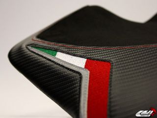 We use a carbon fiber textured marine grade vinyl which reflects like