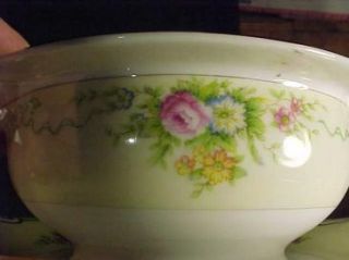 This is a Grace China Formal Garden Gravy Boat w/ Attached Underplate