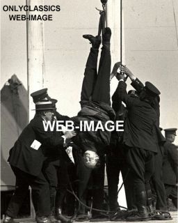 Magician Harry Houdini Hanging Upside Down Photo Magic