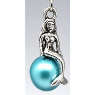 Divine Beads Mermaid sitting on Faux Turquoise Pearl