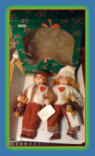 Danea Porcelain Brother & Sister DollsWITH THEIR COAS HANGING FROM