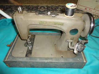 NEW HOME SEWING MACHINE IN CASE