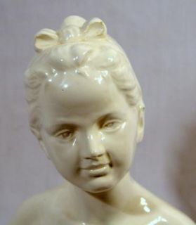 is a porcelain bust of a famous Houdon sculpture of Louise Houdon