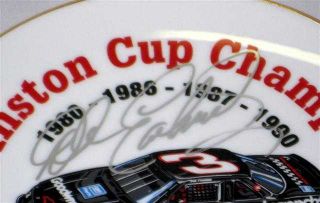 APPROX. 8.25 PLATE OF DALE EARNHARDT SR., HAND SIGNED BY DALE.