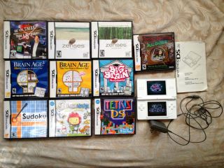 Nintendo DS lite with 10 games, charger, 2 stylus all with cases