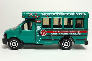 2011 Matchbox City Life GMC School Bus TEAL/MBX SCIENCE CENTER/MINT