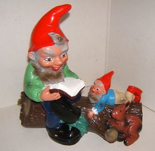 Gnome Sitting on a Log Reading to a Baby + Rabbit   Discontinued Item