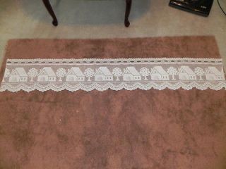 Used crochet doilies Valance has a house on it there is some