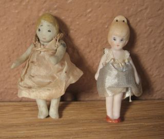 Vintage Set of 2 Bisque Ceramic Girl Dolls 2 1/2 Inches Painted Faces