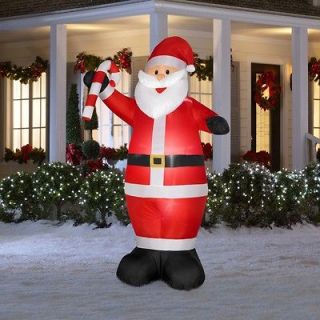 . Airblown Lighted Santa with Candy Cane Christmas Outdoor Inflatable