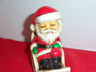 Vintage Santa Sleeping in rocking chair figure ceramic, Rocks