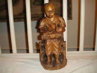 Wood Carving Of African Woman Holding Baby Sitting On A Chair Detailed