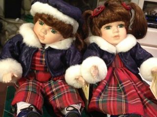 Collectors Choice WindupMusical Animated Porcelain Sitting Dolls