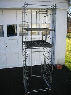 USED BAKERY BREAD RACK FOLD ABLE/ROLL ABLE W 2 TRAYS