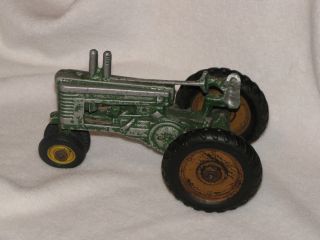  Ertl John Deere A toy tractor late 40s w Arcade front wheels Damaged