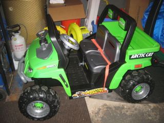 Green  Power Wheels Ride on kids Arctic Cat car sits two Pick