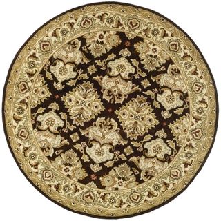 Handmade Traditions Dark Mocha/ Ivory Wool Rug (8 Round) (BrownPattern OrientalTip We recommend the use of a non skid pad to keep the rug in place on smooth surfaces.All rug sizes are approximate. Due to the difference of monitor colors, some rug colors