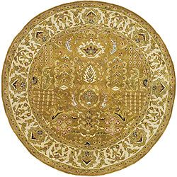 Handmade Classic Gold/ Ivory Wool Rug (6 Round) (GoldPattern OrientalTip We recommend the use of a non skid pad to keep the rug in place on smooth surfaces.All rug sizes are approximate. Due to the difference of monitor colors, some rug colors may vary 
