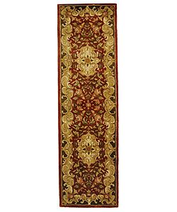 Handmade Classic Juliette Rust/ Green Wool Runner (23 X 10) (RedPattern OrientalMeasures 0.625 inch thickTip We recommend the use of a non skid pad to keep the rug in place on smooth surfaces.All rug sizes are approximate. Due to the difference of monit