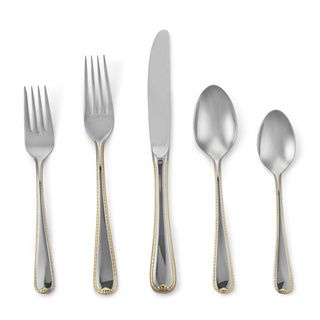 Golden Ribbon Edge 5 piece Flatware Place Setting (Silver/ goldFinish Polished stainless steelPattern RibbonCare Instructions Dishwasher safeMaterial 18/10 Stainless steelService for One (1)Set includes One (1) dinner spoon, one (1) teaspoon, one (1