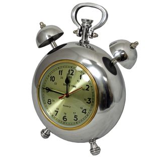 Ships Time 12.5 inch Polished Nickel Metal Table Clock (Polished nickelMaterials AluminumQuantity One (1)Setting IndoorsBattery size Uses one (1) AA battery (not included)Care instructions Wipe with a soft dry clothDimensions 12.5 inches high x 6.5 