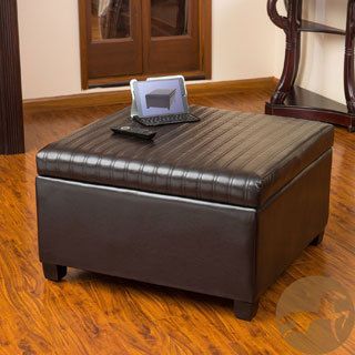 Christopher Knight Home Cano Espresso Leather Storage Ottoman (EspressoFeatures Storage unitUse for extra seating, as a coffee tableSome assembly requiredDimensions 18.50 inches high x 31 inches wide x 31 inches deepInterior dimensions 11.5 inches high